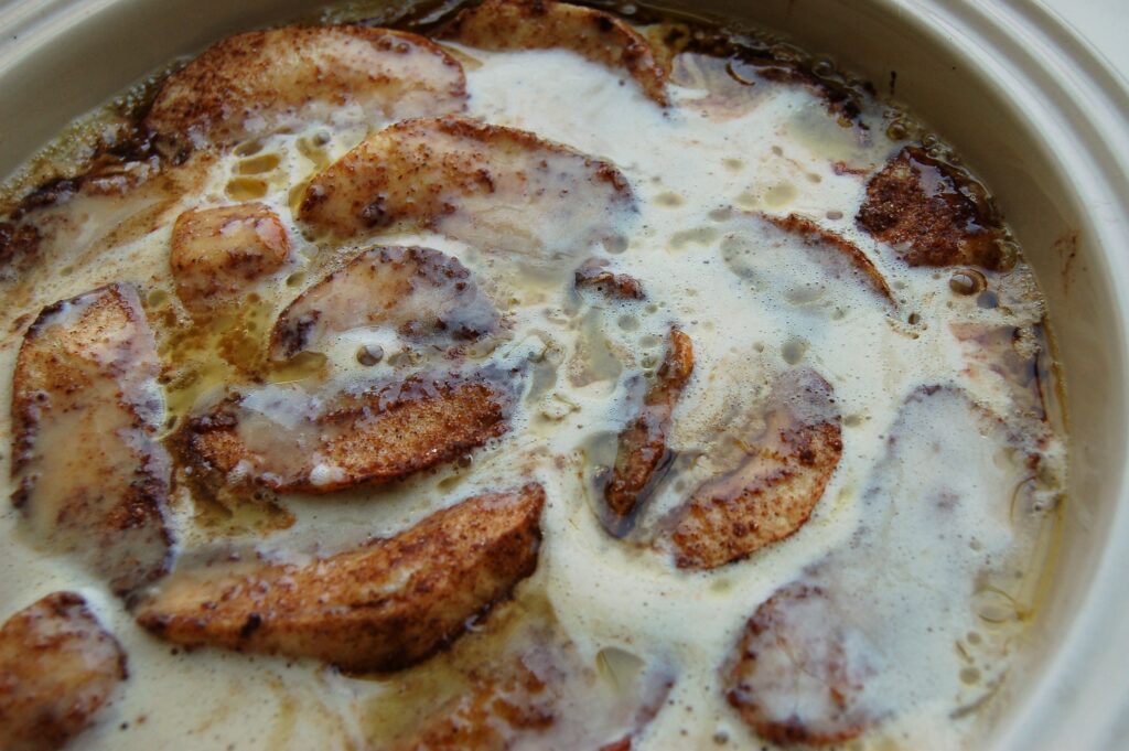 Apple pancakes add batter