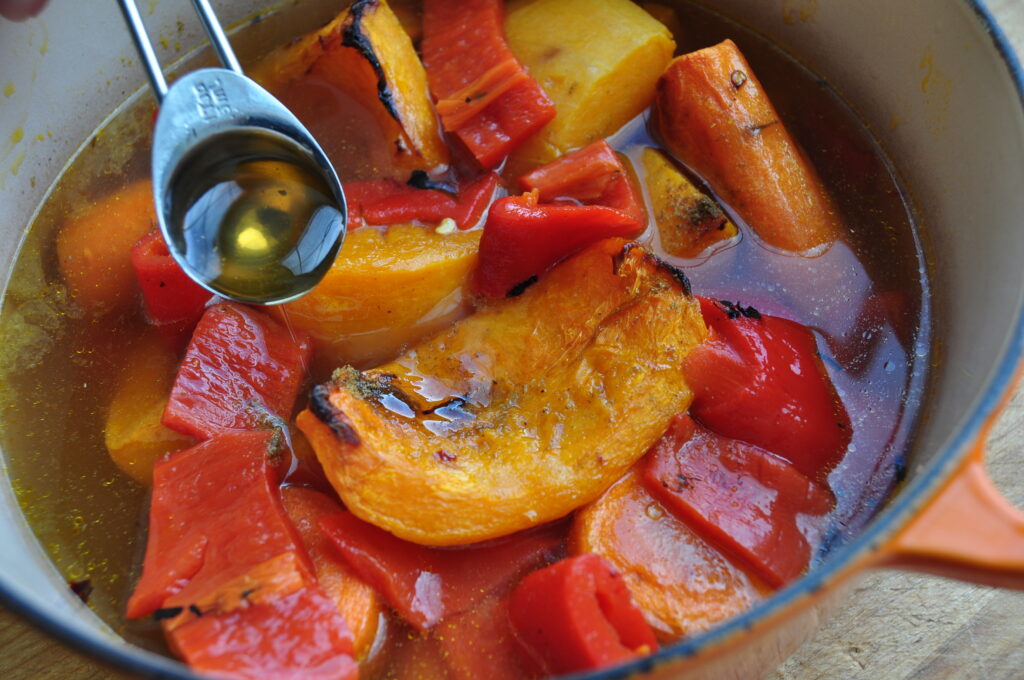 Add the honey and cumin to the veg - soup