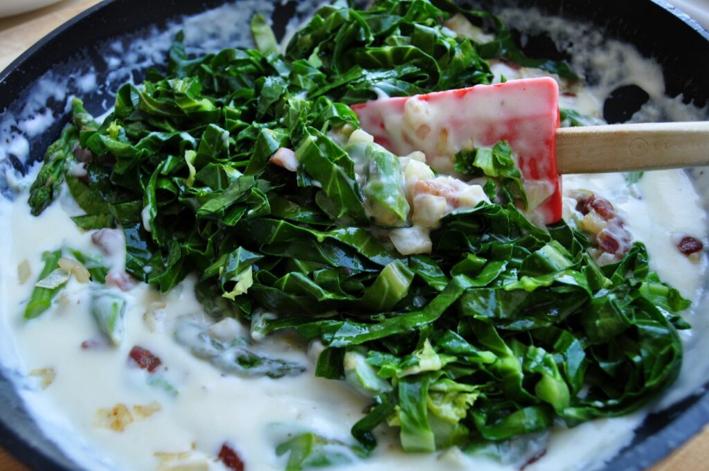 Add spring greens to pan web
