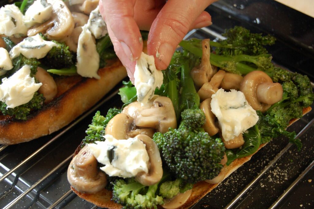 Pile on toast & crumble over cheese - web