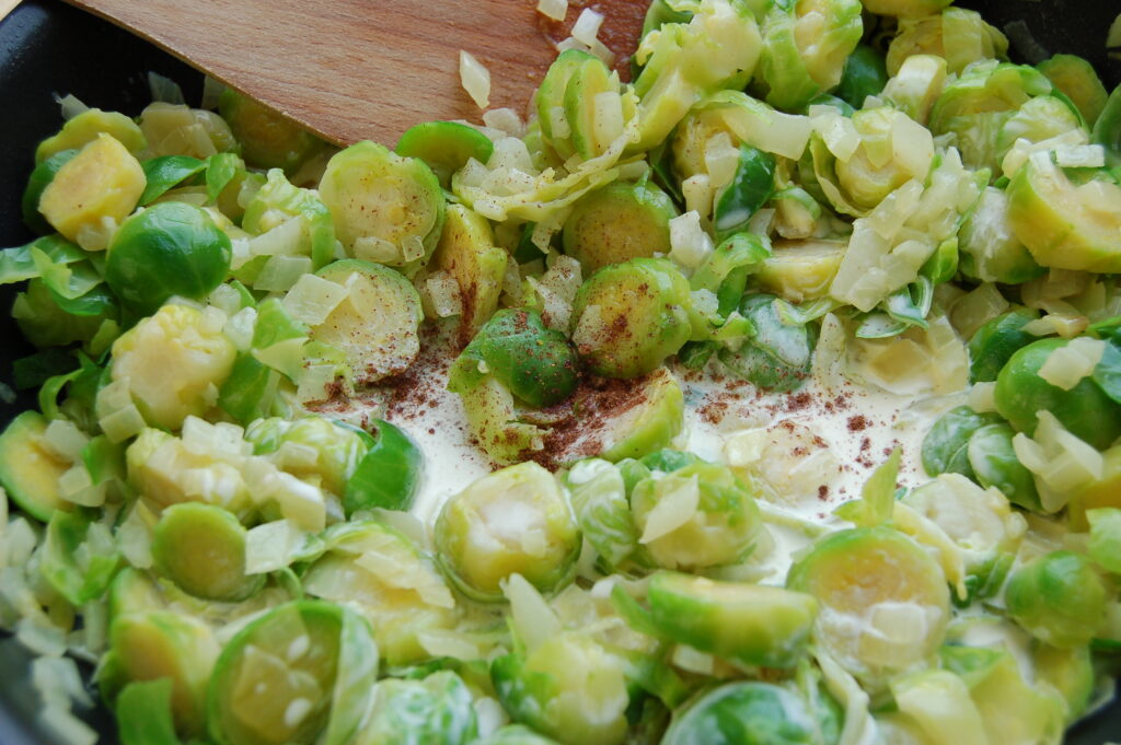 Add cream to sliced sprouts & onions