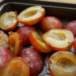 toss plums in sugars