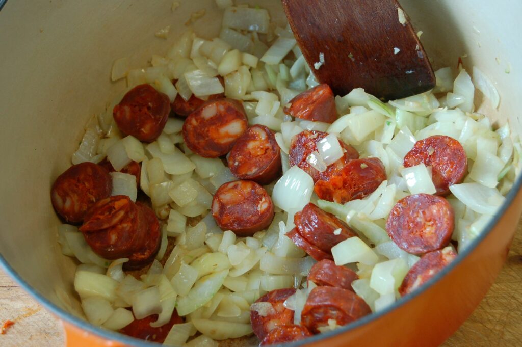 Add chorizo to onions web