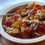 Herby new potatoes baked with feta, olives, tomatoes web