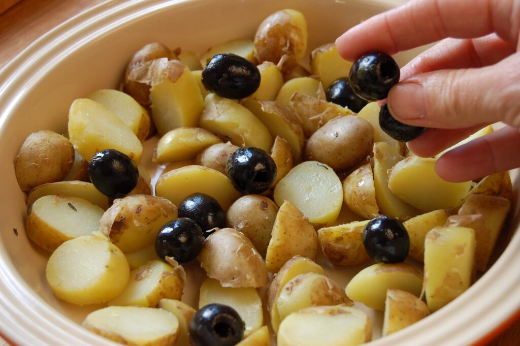 Pots and olives in dish web