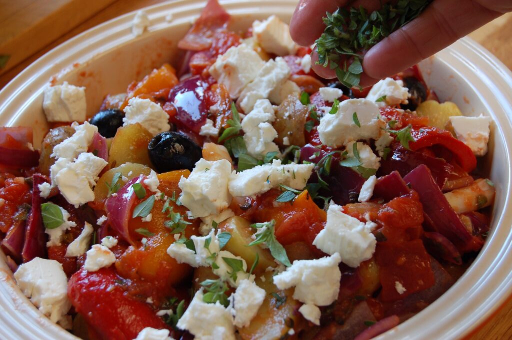 Scatter oregano and feta web